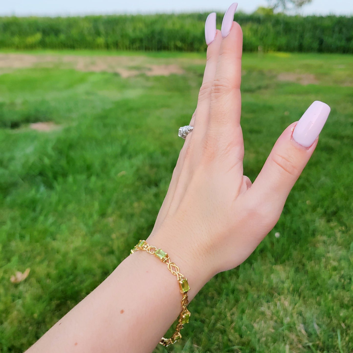 14k Yellow Gold Signed Gemstone Bracelet by Clyde Duneier Baguette Peridot Sailor's Knot