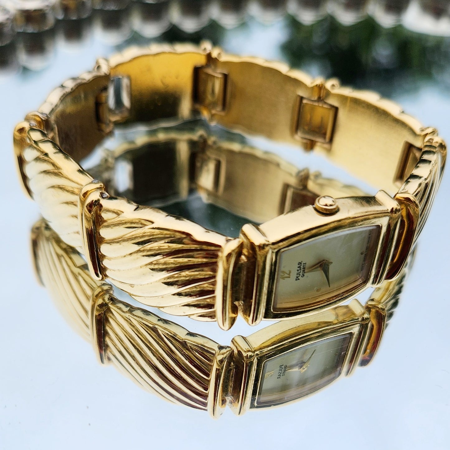 Vintage 90s Gold Tone Pulsar Bracelet Watch